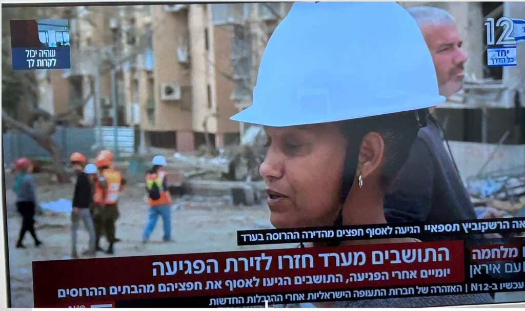 לאה -מנהלת עד מזירת הפגיעה בין הבניינים