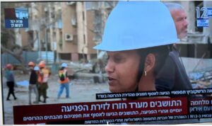 לאה -מנהלת עד מזירת הפגיעה בין הבניינים